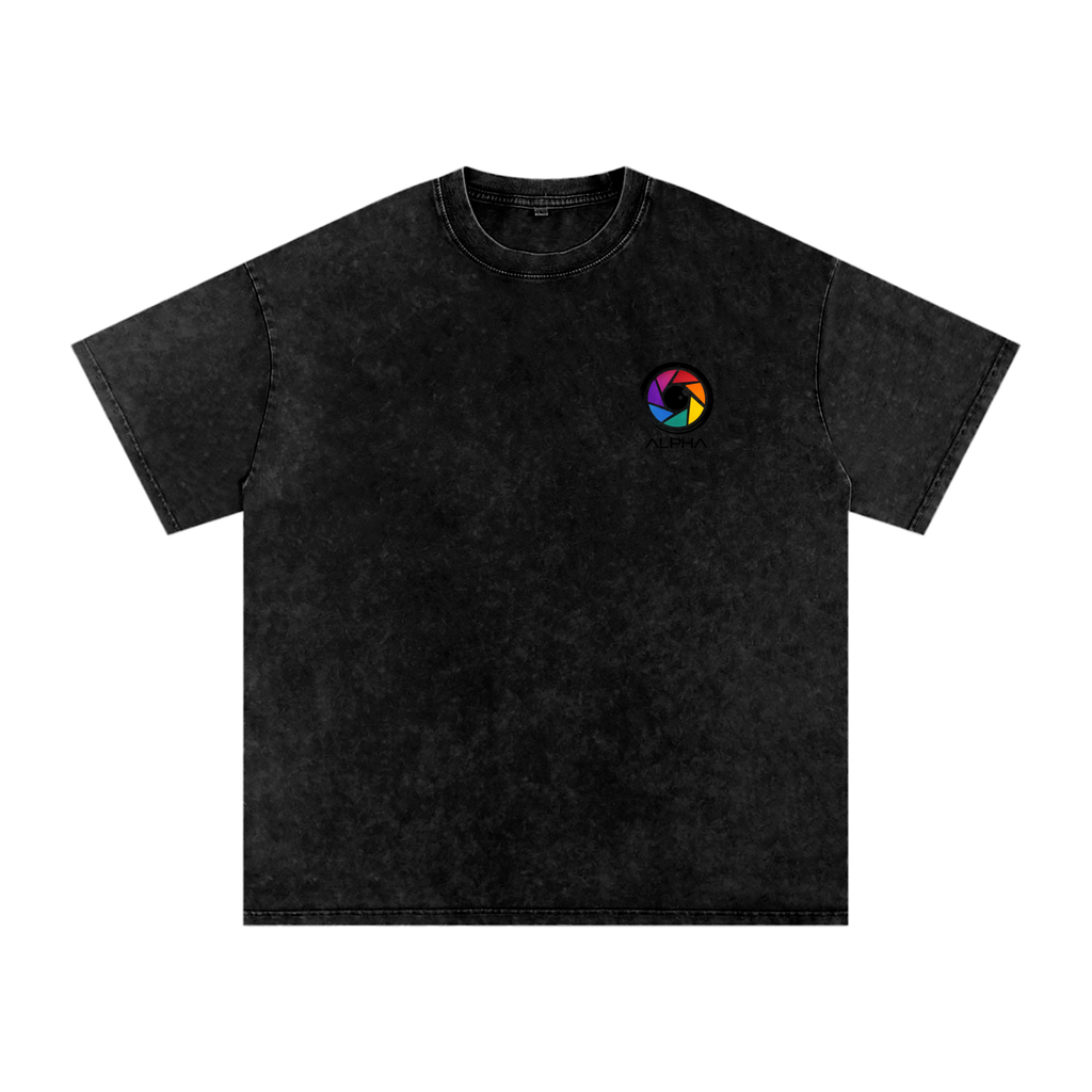 PA in Alpha Visual Artists black galaxy fade oversized tee loading gear between setups