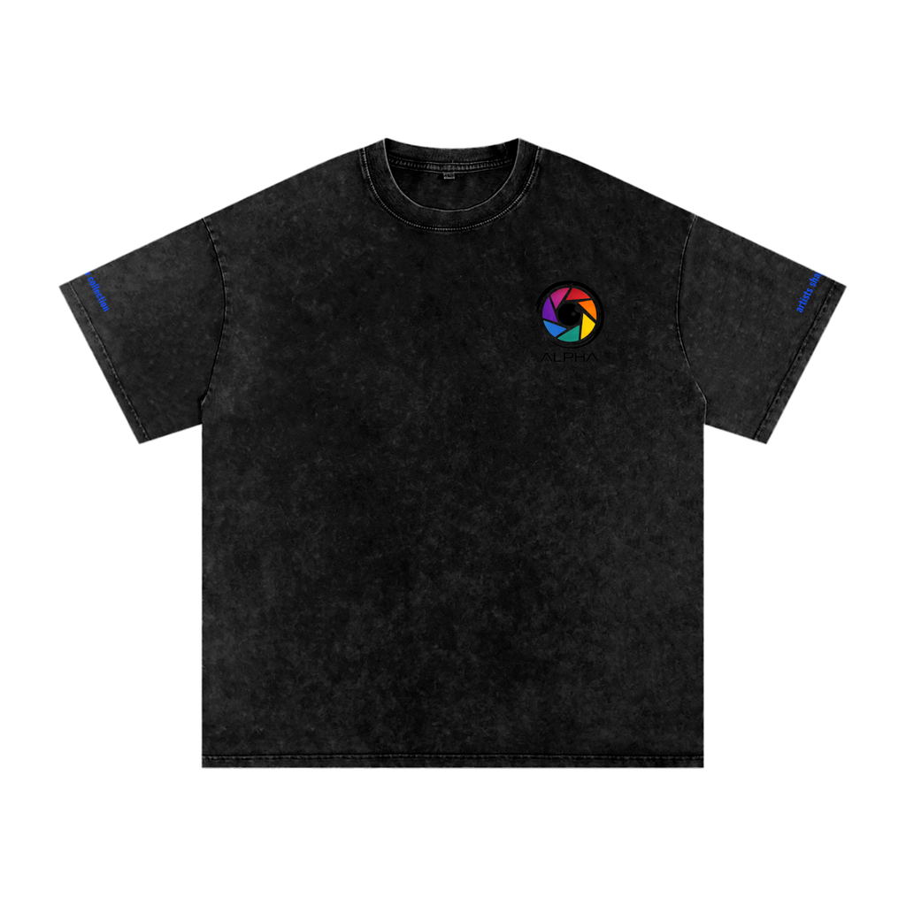 Camera op in Alpha Visual Artists black temple lettering tee checking playback on location