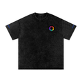Camera op in Alpha Visual Artists black temple lettering tee checking playback on location
